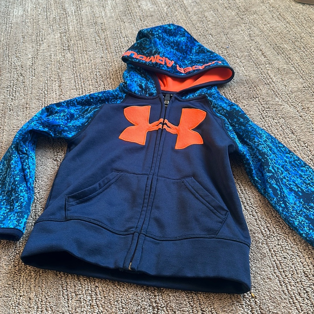 Under Armour zip up sweatshirts size 4.
